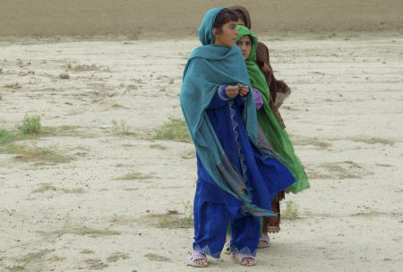 Tani District, Khost Province, Afghanistan- Young Afghan girls come out to investigate the presence of U.S. and ISAF personnel conducting a meeting with village elders in eastern Afghanistan.
Published by National Geographic.