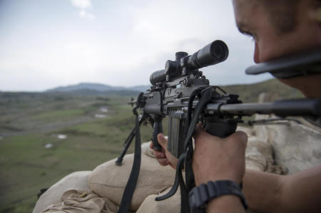 Sabari District, Afghanistan- A Solder from the U.S. Armys 1st Battalion, 26th Infantry Regiment scans the area around his base while testing a newly-fielded rifle system. Called the Blue Spaders, the 26th Infantry Regiment was founded in 1901, and has served in World War I, World War II, Vietnam, and the Global War on Terror. 
Published by National Geographic.