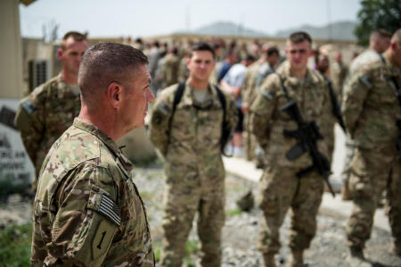 The Chaplain executed an about face, and the four men snapped to attention. The hospital staff member opened the containers doors. The men entered the box, and the lead solder was heard giving commands. After a short moment, the men reappeared bearing a stretcher that held the body of a fallen US Army Sergeant, draped in the American flag. The men and women gathered snapped to attention. The detail brought the fallen soldier to the Chaplain, who, after a moment of whispered prayer, about-faced and led the detail slowly down the pathway.
Published by National Geographic.