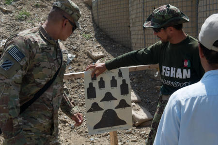 A U.S. Army sergeant instructs members of a select Afghan National Armys Commando unit in the use of the M249 Squad Automatic Weapon. The ANAs Commando units are referred to as Kandaks and usually consist of 600 commandos.
Published by Business Insider.